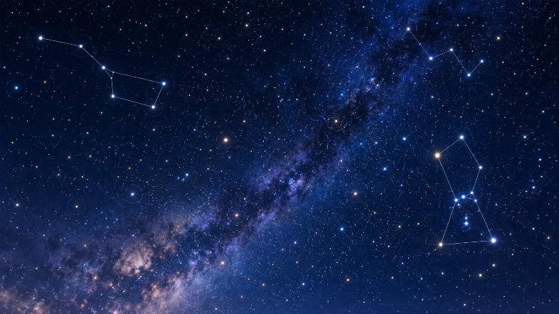 Ciel étoilé avec plusieurs constellations dessinées en lignes fines sur fond de Voie lactée.